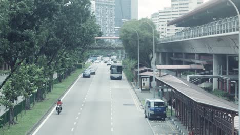 city street with mrt station and bus stop in singapore