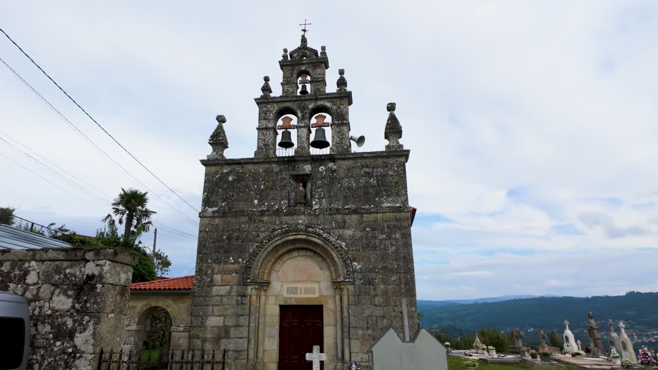 View of the church and surrounding landscape of San Xillao de Rivela in Coles, Ourense, Galicia, Spain