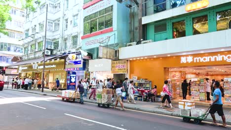 pedestrians and vendors on a bustling street