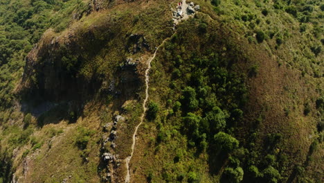 Vertical-shot-of-beautiful-green-hill-in-Chinese-national-park