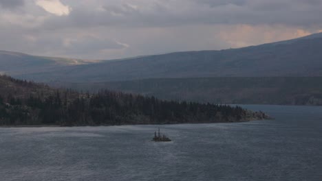 East-Glacier,-St-Mary-Lake-in-stormy-condition-with-wild-goose-Island-in-the-middle