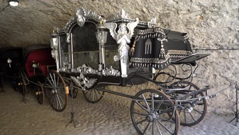 antique horse drawn carriage displayed at museum