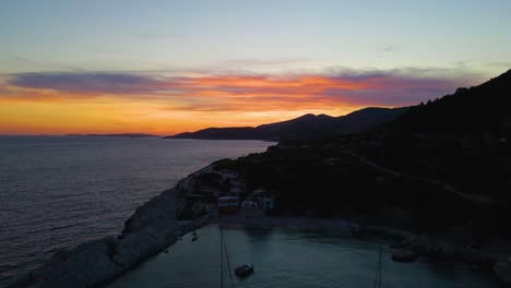 sunset on the background of mountains, bay, yachts in the coastal city of croatia on the adriatic sea