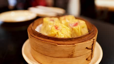 delicious dumplings served in a bamboo steamer