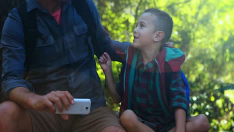 Father-and-son-interacting-with-each-other-in-the-park