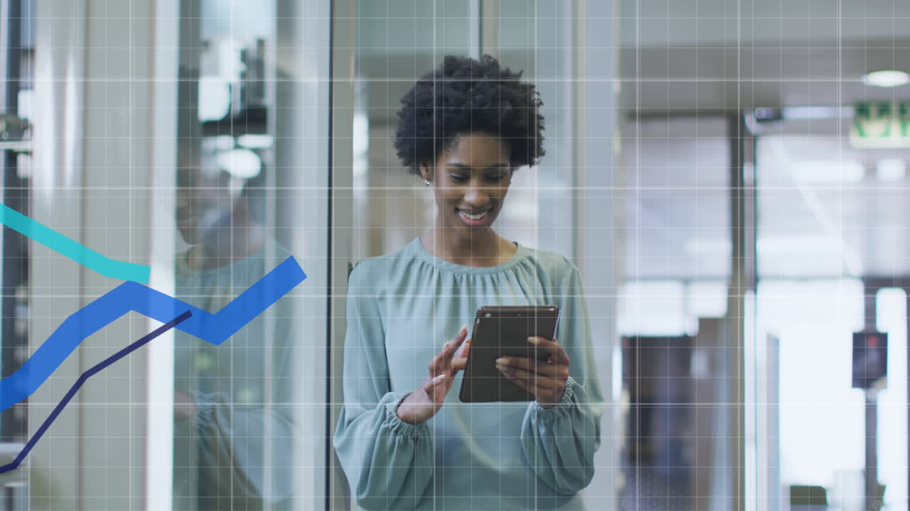 Animation of financial data processing over african american businesswoman using tablet