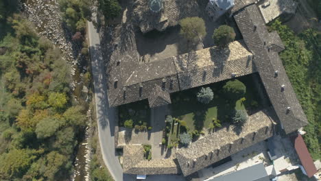 aerial, fly over to troyan monastery in bulgaria in the middle of the woods