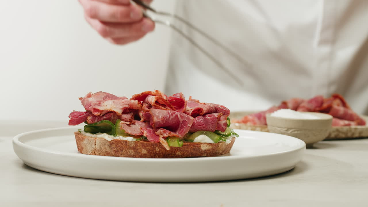 Chef Preparing a Gourmet Sandwich