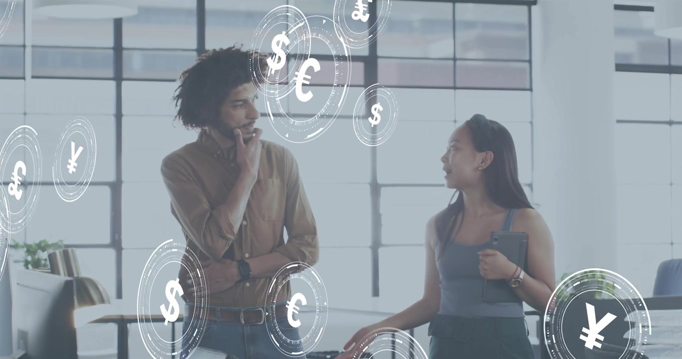 Office colleagues sweeping hand and tapping tablet, summoning floating currency icons for finance