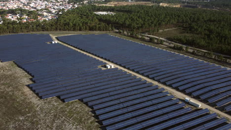 flying towards solar farm at daytime. - aerial