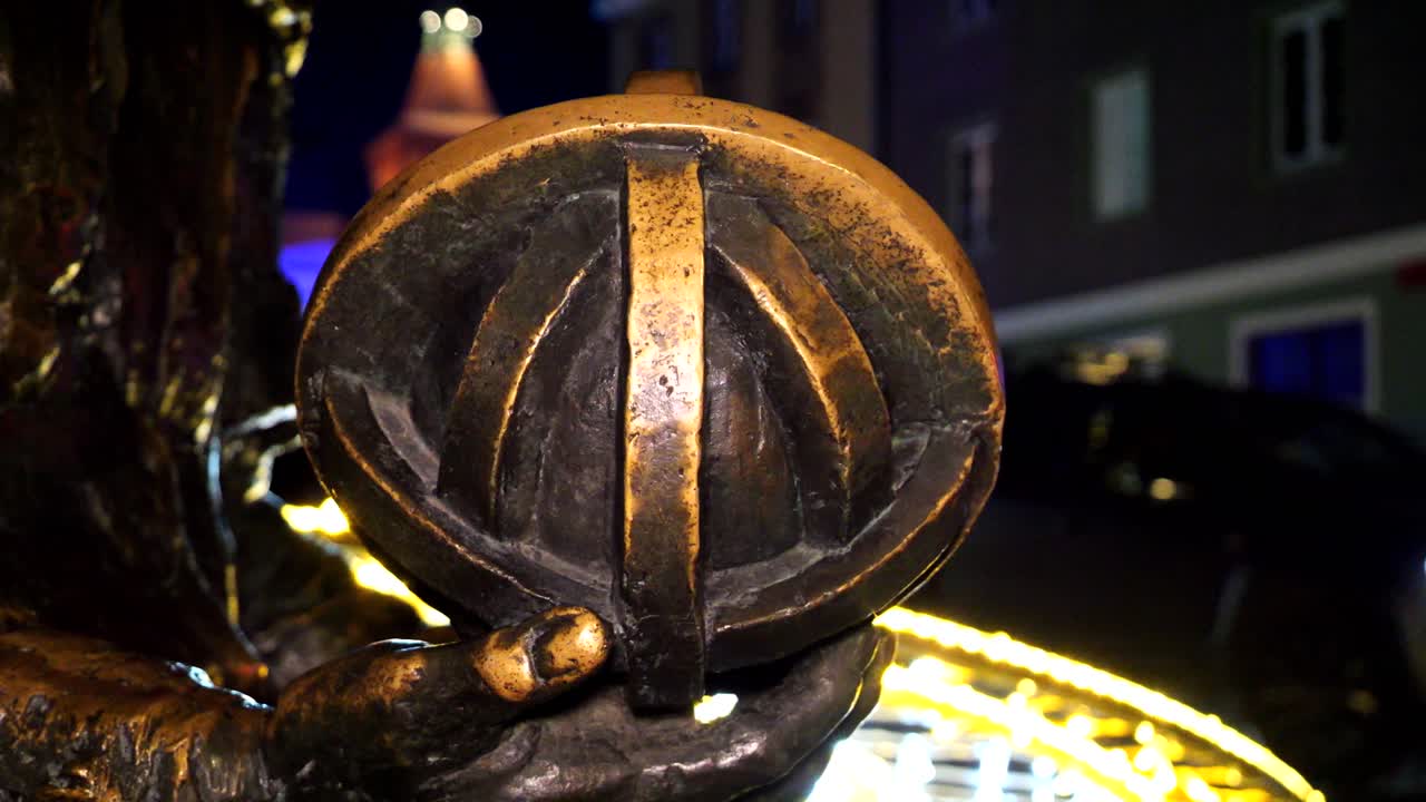 City of Olsztyn, close-up of the astrolabe – an astronomical instrument used to observe celestial bodies – held by the Nicolaus Copernicus monument