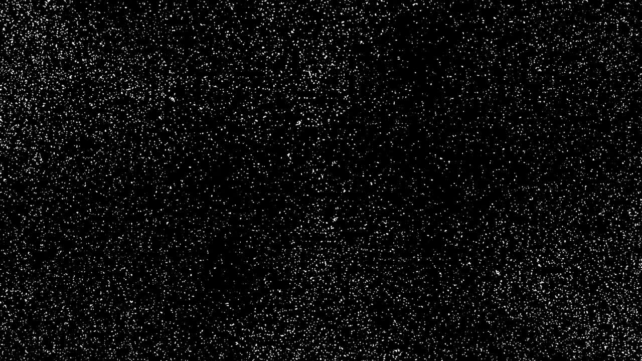 Neve bianca che cade velocemente o piccoli fiocchi astratti su sfondo nero