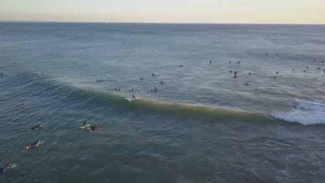 aerial view with surfing on wave