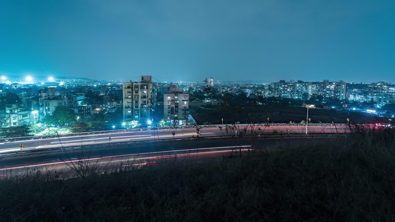 Busy Highway Traffic Time lapse of Mumbai - Pune - Bengaluru national Highway from a hill, Maharashtra, India