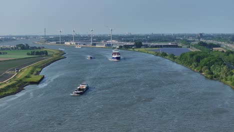 Container-ships-on-Dordtse-Kil-River:-Exploring-the-scenic-waters-near-'Gravendeel-Village