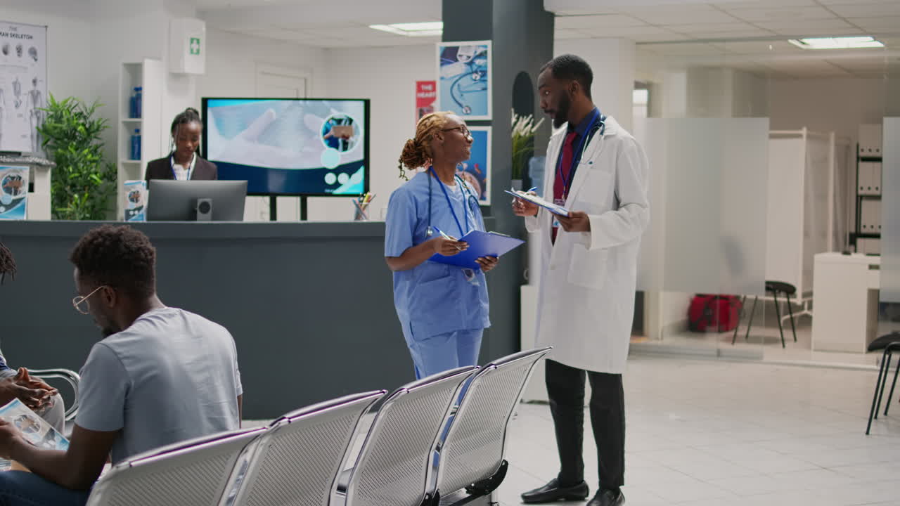 Medical staff meeting in hospital waiting room to discuss about healthcare