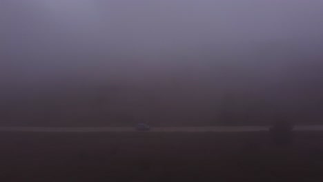 just one car driving in the dangerous scene