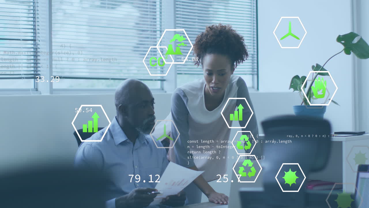 Animation of icons and computer language over diverse coworkers discussing reports