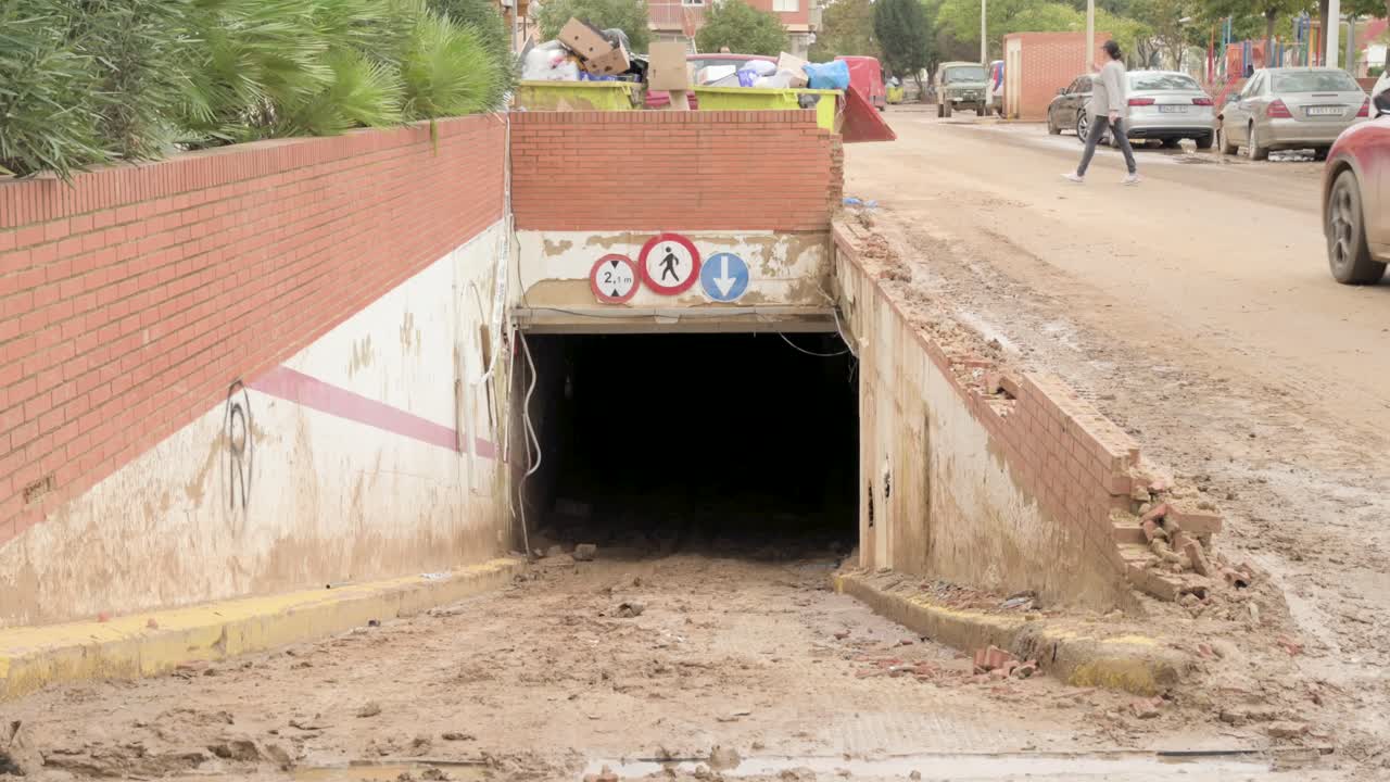 Subway garage entrance covered in mud and debris after Valencia flooding