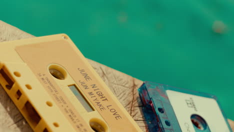 vintage cassette tapes by the pool