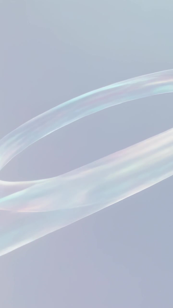 Vertical video: Starting playback, opalescent ribbon loop moving across bluish backdrop for display
