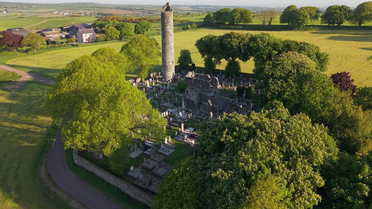 Historic Round Tower of Ancient Monastic Site of Monasterboice in Louth, Ireland
