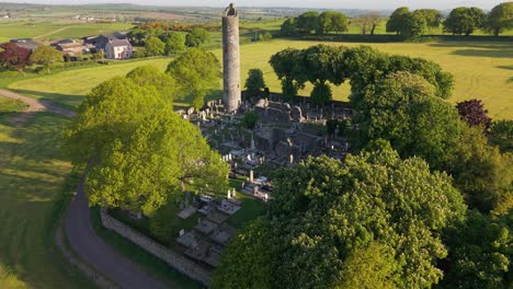 historic round tower of ancient monastic site of monasterboice in louth, ireland