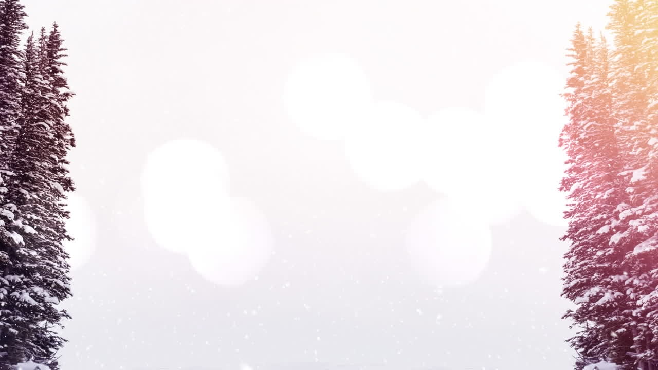 Animación de nieve cayendo sobre árboles en un paisaje invernal navideño