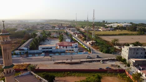 Aerial-panorama-revealing-mosque-minaret,-church