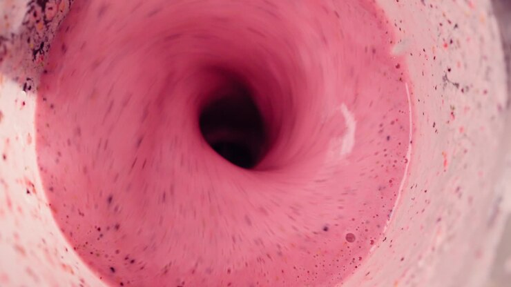 Close-Up of Pink Smoothie Blending in a Blender