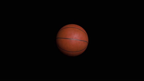 orange basketball on black background