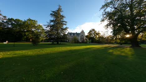 fast approaching low fpv shot of stunning grafenegg castle