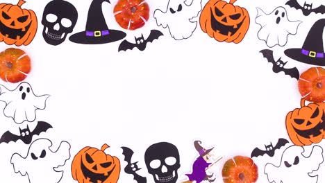 halloween frame of pumpkins, skulls, bats, ghosts move with empty space for text. stop motion