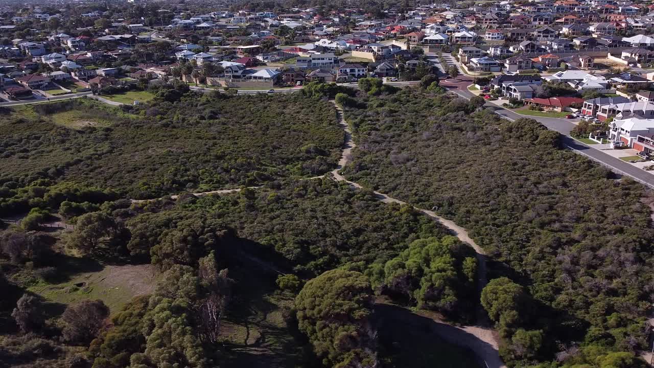 Aerial Orbit View Of Nature Reserve Surrounded By Houses Near Quinns Rocks, Mindarie Beaches Perth
