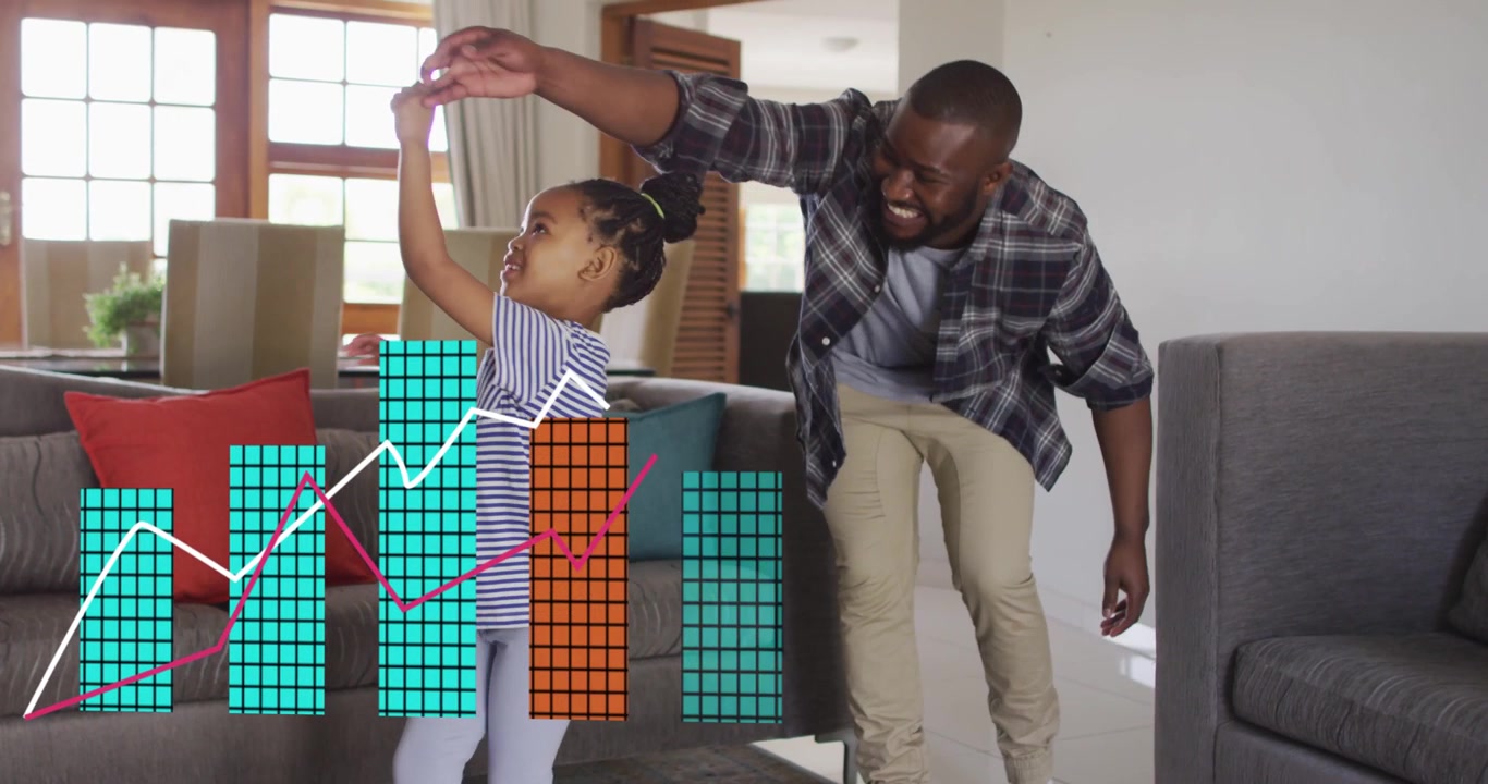 Father reaching for daughter's hand, guiding playful twirl in home, finance charts rising below