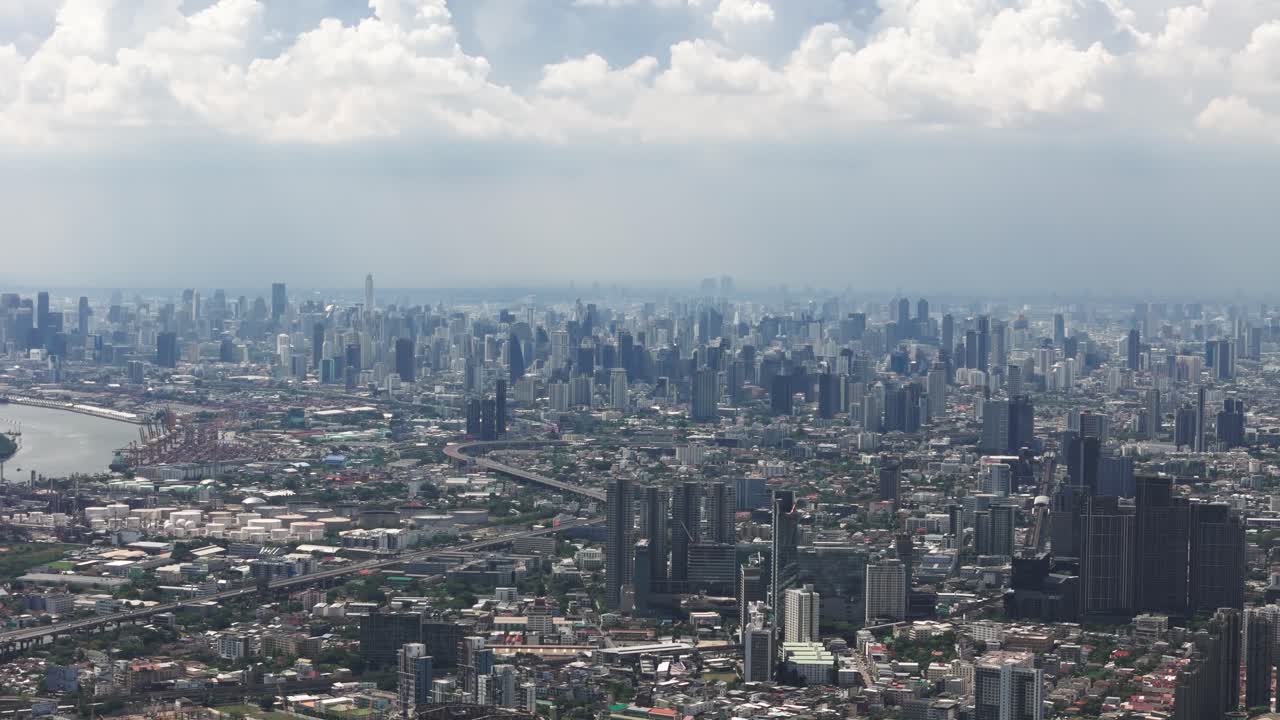 Fly sideways with view of Bangkok cityscape