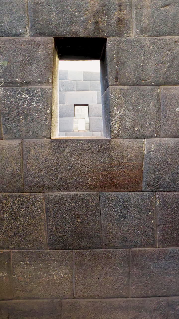 A detailed video focusing on the masterful stonework of the Inca walls within the sacred Coricancha temple in Cusco. This footage highlights the precision and craftsmanship of the stonework