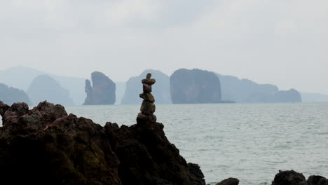 one stone over the other in thailand at the sea