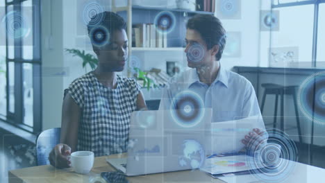 in office, business professionals interacting with animation on digital interface