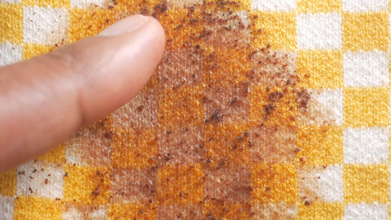 Stain on checkered fabric