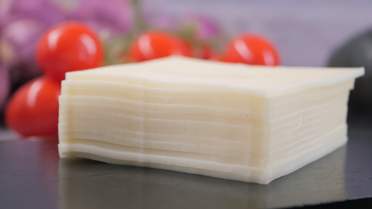 Sliced cheese and tomatoes