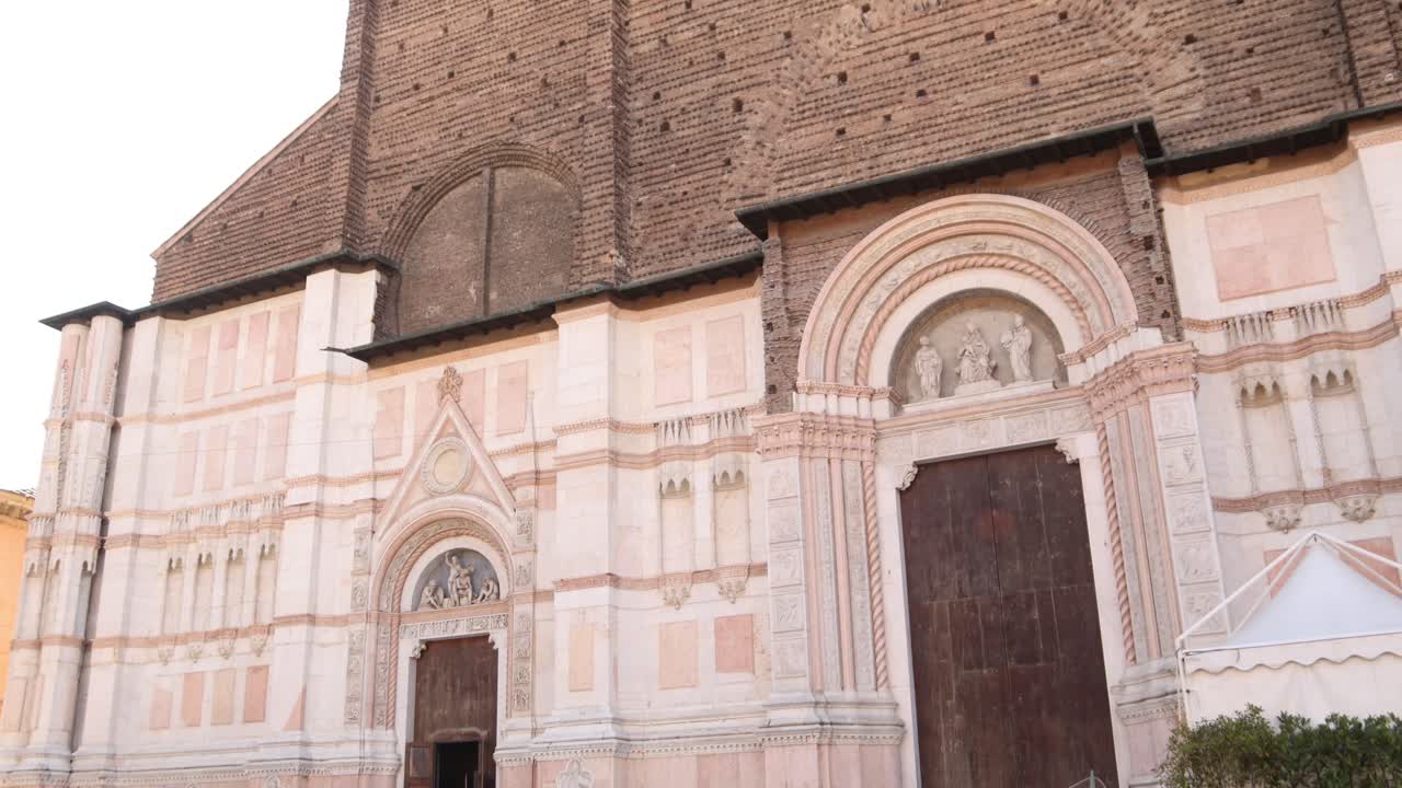 Close-Up of Basilica di San Petronio’s Ornate Facade in Bologna, Italy