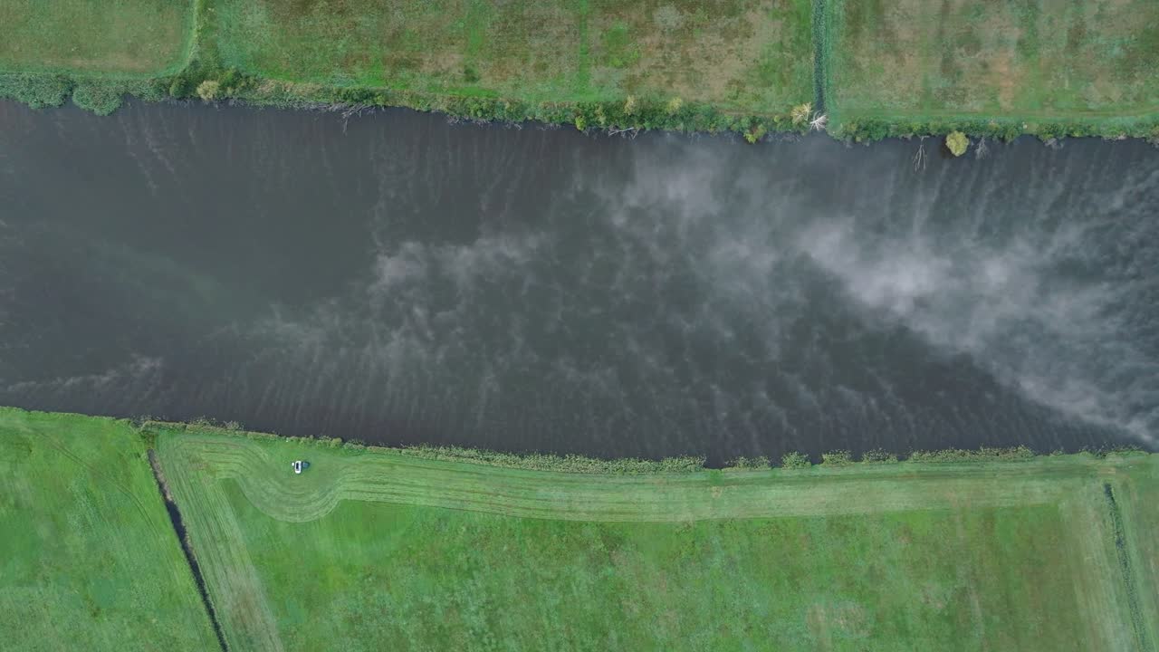 Aerial View of a River with Fog on a Calm Morning