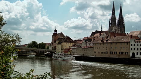 small ship passing danube river in germany