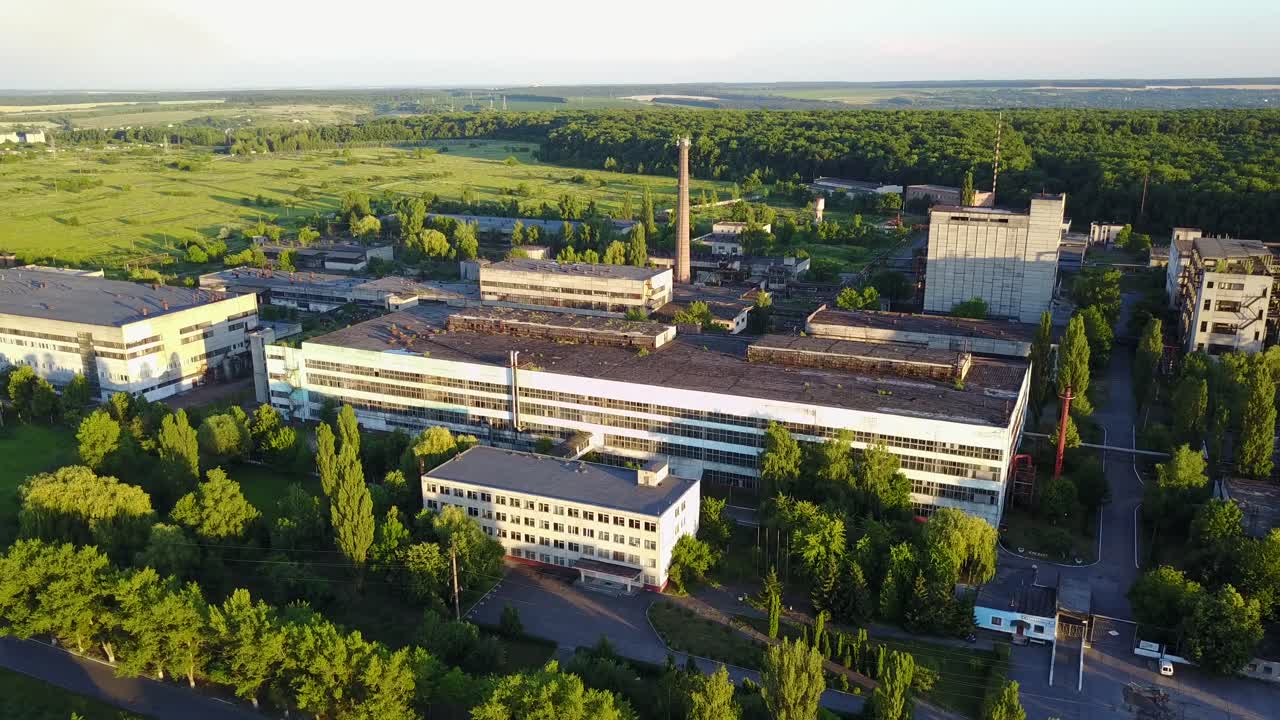 Old Abandoned Factory Buildings. Abandoned old factory buildings with closed door and windows