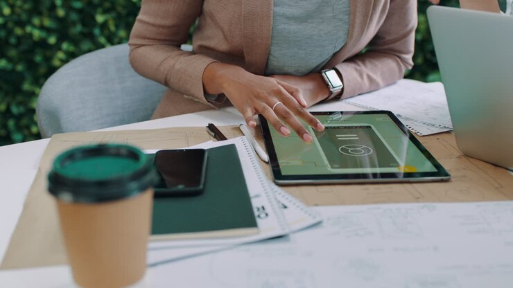 Professional Woman Working on Digital Tablet in Office