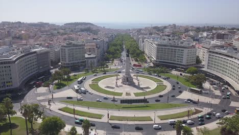 sunny day lisbon city marquess of pombal square aerial park panorama 4k portugal