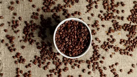 bowl of coffee beans on canvas