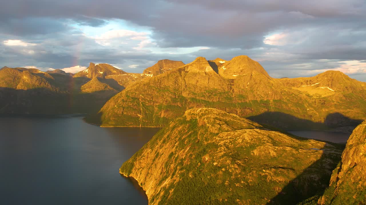 Capture the beauty of Finnkonakken during golden hour in stunning 4K. This high-quality drone footage features dramatic landscapes and cinematic aerial views of Northern Norway.