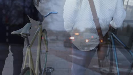 animation of cars over diverse people walking with bikes